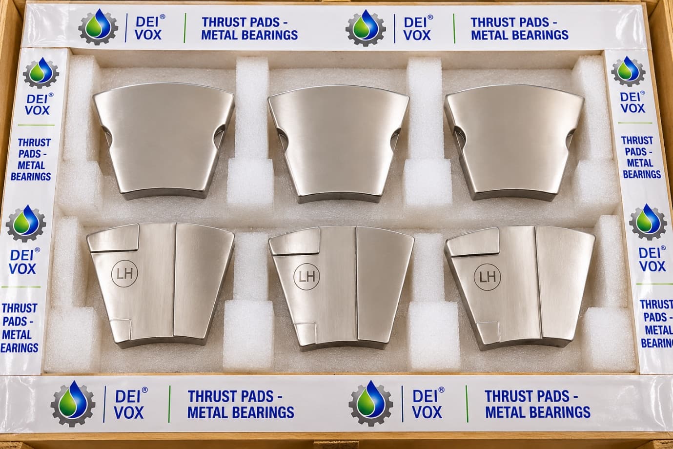 Packaged metal bearing thrust pads